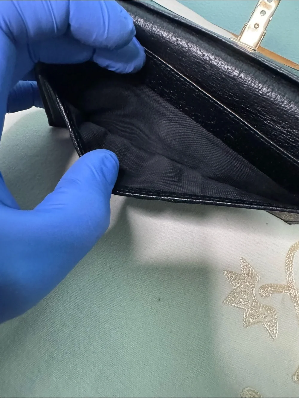 Gucci Black Leather Wallet with Gold-Tone Clasp